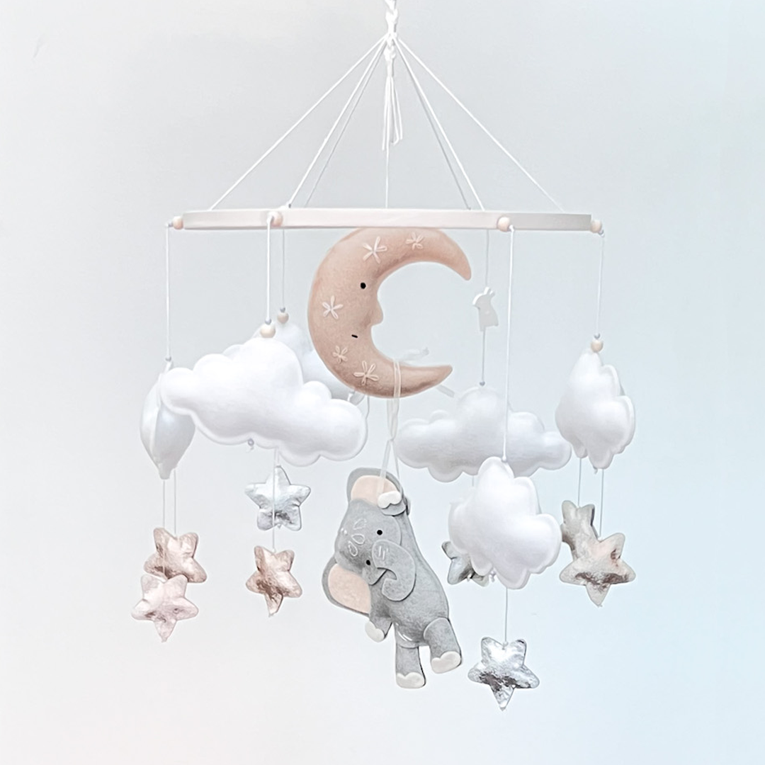 Hanging on baby mobile